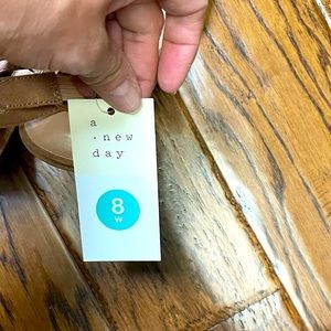 Brand new, target heel sandals in Tan.